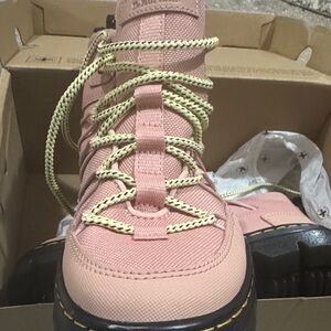 Dr. Martens Pink Combat Boots with Yellow Laces